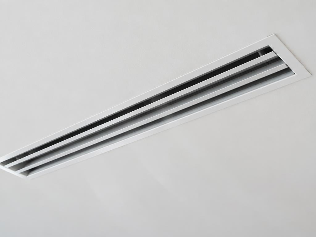 Linear ceiling vent of a ducted air conditioning system